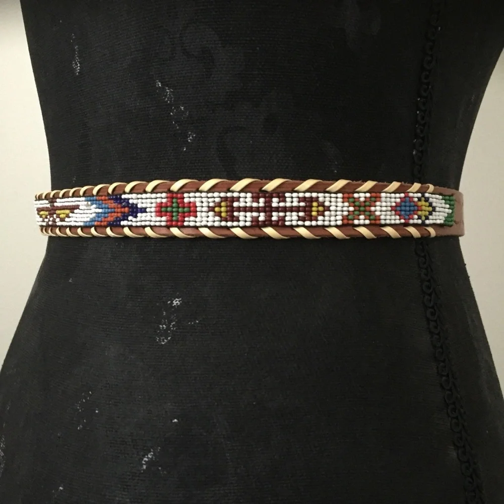 Vintage beaded belt size 26. Firebird design.